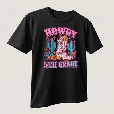 Colorful cartoon T-shirt featuring cowgirl boots and the phrase HOWDY 5TH GRADE — printed on a unisex t-shirt (angled view)