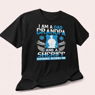 Vintage distressed shirt featuring sheriff silhouette and text about roles — printed on a unisex t-shirt (angled view)