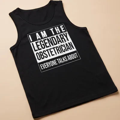 Bold typography t-shirt stating the legendary obstetrician everyone talks about — printed on a tank top