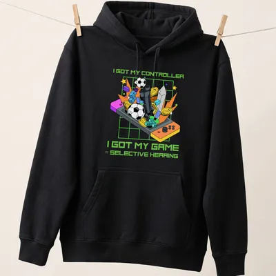 Colorful cartoon design featuring a video game controller and humorous text about gaming. — printed on a unisex hoodie
