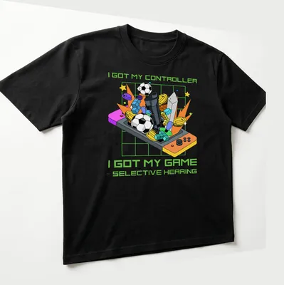 Colorful cartoon design featuring a video game controller and humorous text about gaming. — printed on a unisex t-shirt (angled view)