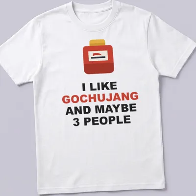 Minimalist T-shirt with bold text about gochujang and a container graphic