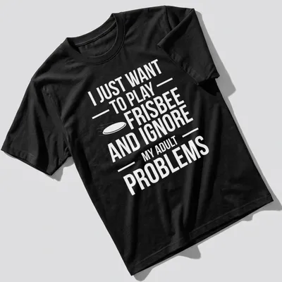 Bold typography t-shirt featuring a playful phrase about frisbee and ignoring adult problems