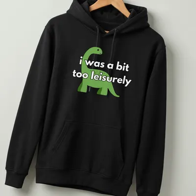 Cartoon dinosaur graphic with humorous text about being leisurely — printed on a unisex hoodie