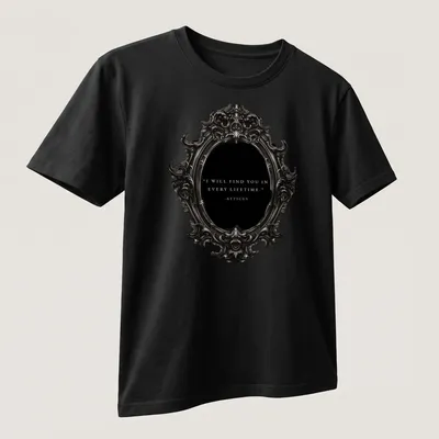 Ornate mirror design with the text: I WILL FIND YOU IN EVERY LIFETIME - ATTICUS in vintage style. — printed on a unisex t-shirt (angled view)