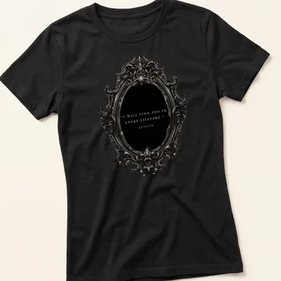 Ornate mirror design with the text: I WILL FIND YOU IN EVERY LIFETIME - ATTICUS in vintage style. — printed on a women's shirt