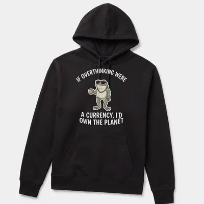 Cartoon frog with the text: If Overthinking Were A Currency, I'd Own The Planet — printed on a unisex hoodie