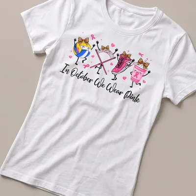 Kawaii cartoon design with volleyball, pink sneaker, pink drink, and awareness ribbons — printed on a women's shirt