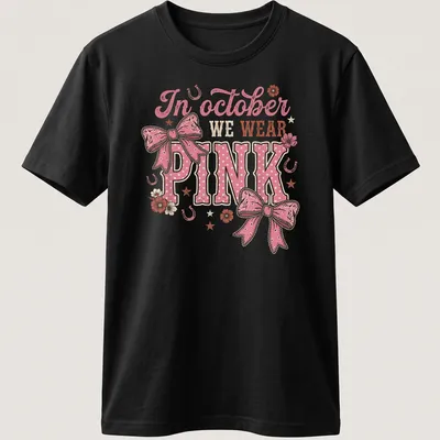 Playful T-shirt with a colorful Western bow and text about October wearing pink — printed on a unisex t-shirt