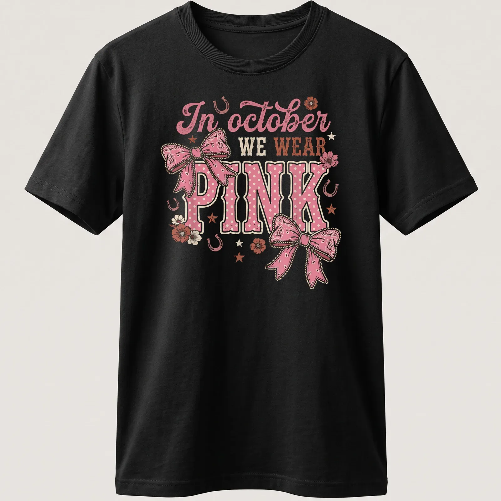 Playful T-shirt with a colorful Western bow and text about October wearing pink — printed on a unisex t-shirt