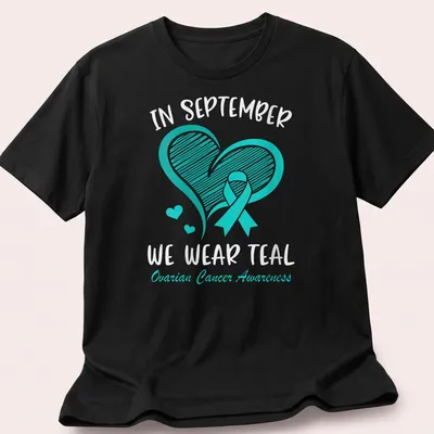 Teal Ovarian Cancer Awareness shirt with teal ribbon and heart design — printed on a unisex t-shirt