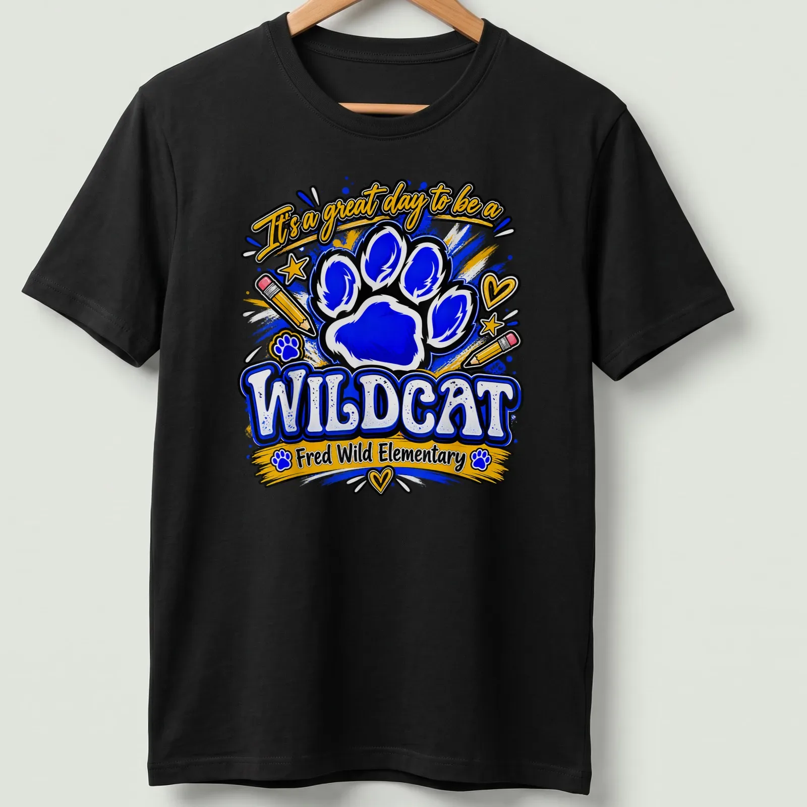 Playful illustration of a wildcat paw print with colorful text for school pride — printed on a unisex t-shirt