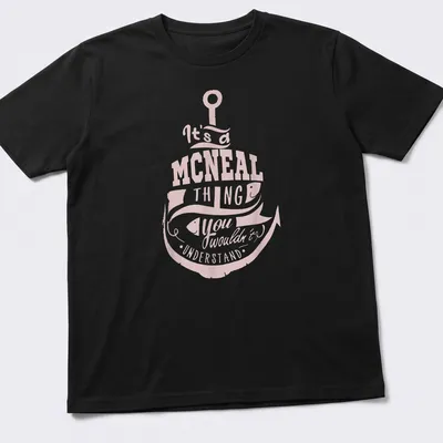 Vintage graphic tee featuring a fishing hook and fish with humor about the McNeal family.