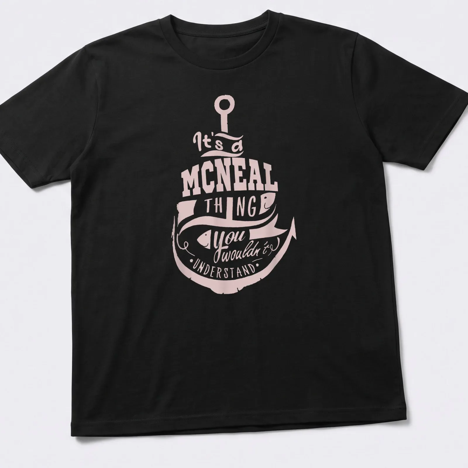 Vintage graphic tee featuring a fishing hook and fish with humor about the McNeal family. — printed on a unisex t-shirt