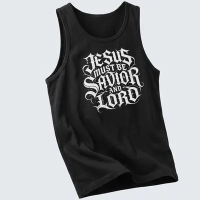 Ornate lettering of 'Jesus Must Be Savior And Lord' in black and white — printed on a tank top
