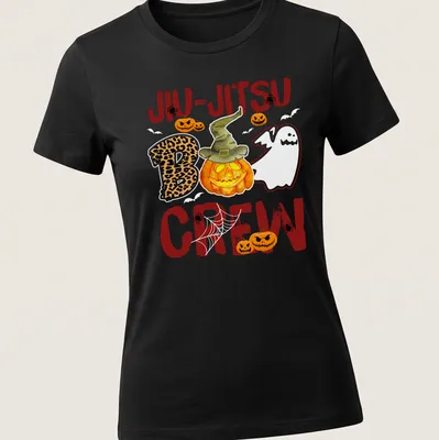 Whimsical cartoon of pumpkin with hat and ghost alongside Jiu-Jitsu Boo Crew text — printed on a women's shirt