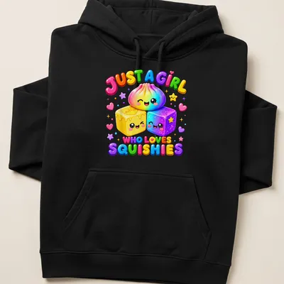 Colorful cartoon T-shirt with kawaii squishy characters and fun lettering — printed on a unisex hoodie