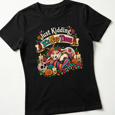 A whimsical goat illustration with marigold flowers and humorous text about napping — printed on a women's shirt