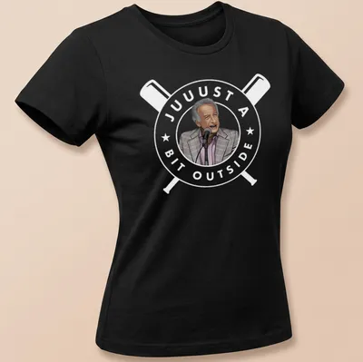 Cartoon of a man at a microphone in gray, light pink, black, and white colors — printed on a women's shirt