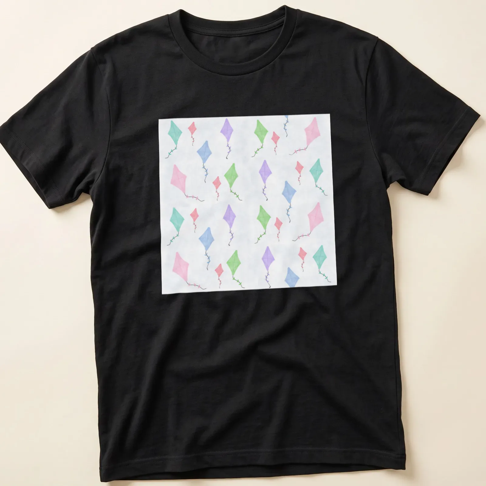 Watercolor design of colorful kites against a light blue sky — printed on a unisex t-shirt