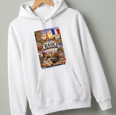 Vintage travel tee featuring Eiffel Tower and French slogan in classic colors — printed on a unisex hoodie