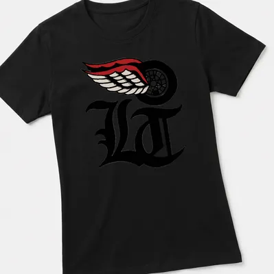 Bold LA logo with wings in black, white, red, and cream — printed on a women's shirt