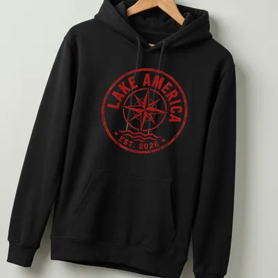 Vintage distressed shirt featuring a compass design with red and white text. — printed on a unisex hoodie