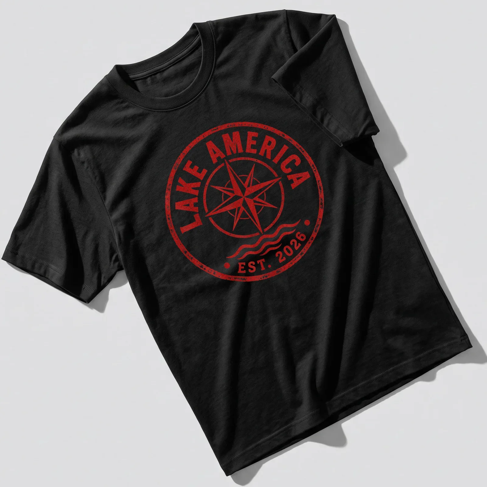 Vintage distressed shirt featuring a compass design with red and white text. — printed on a unisex t-shirt
