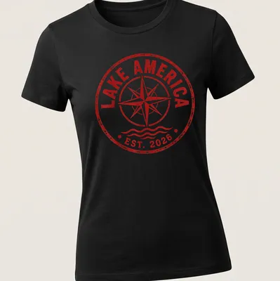 Vintage distressed shirt featuring a compass design with red and white text. — printed on a women's shirt