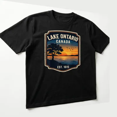 Vintage badge Lake Ontario sunset t-shirt with trees in orange and blue tones — printed on a unisex t-shirt (angled view)