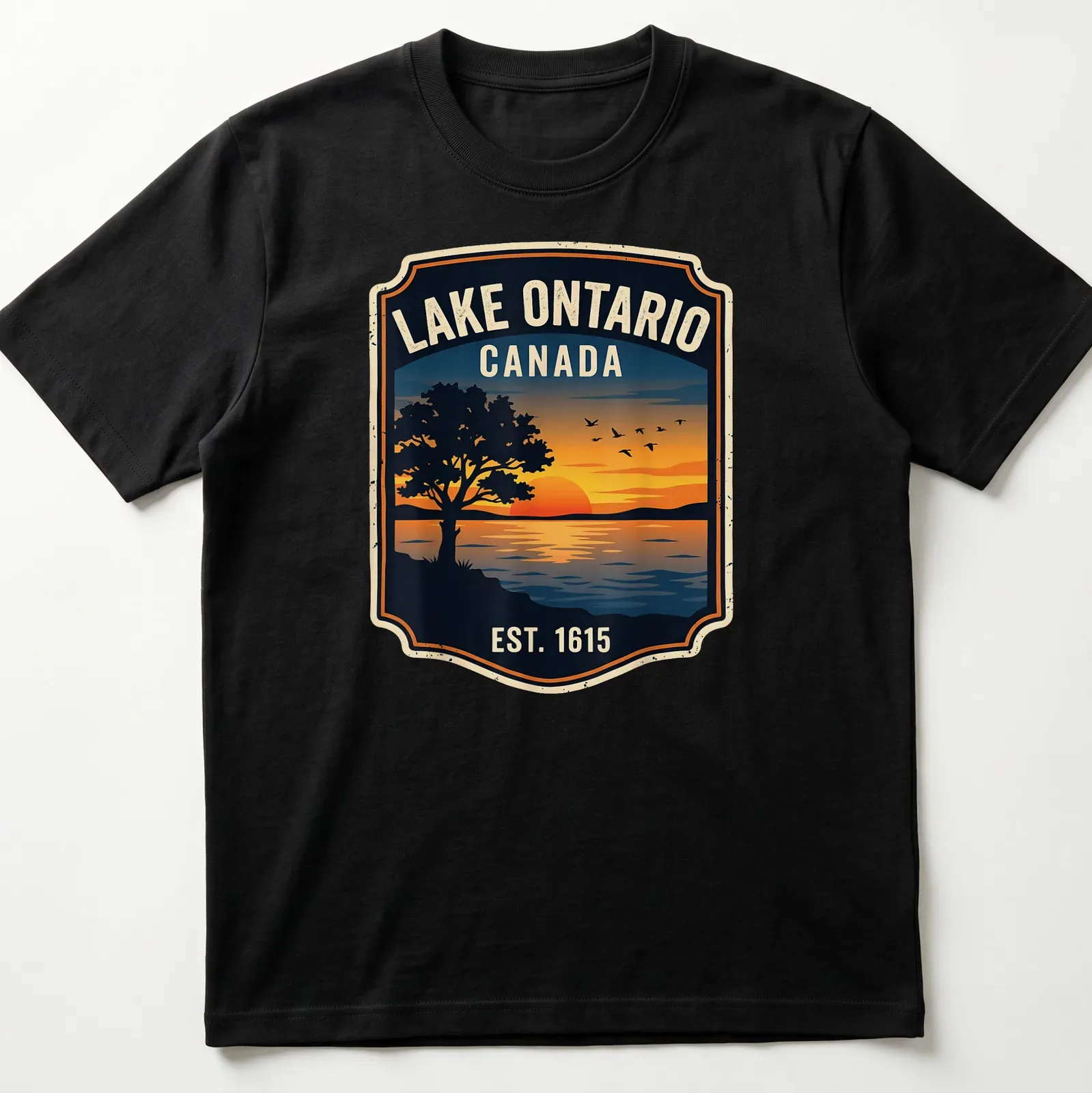 Vintage badge Lake Ontario sunset t-shirt with trees in orange and blue tones — printed on a unisex t-shirt