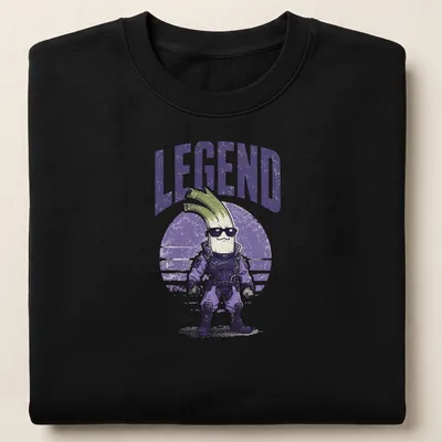 Retro distressed T-shirt featuring a playful celery character and the word 'LEGEND' — printed on a unisex sweatshirt