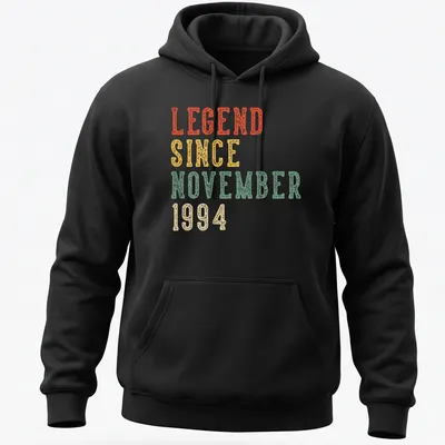 Vintage distressed birthday celebration tee with colorful text proclaiming legendary status — printed on a unisex hoodie