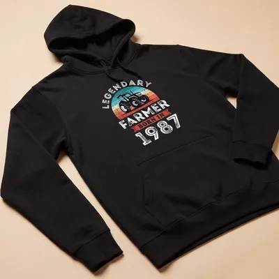Vintage style T-shirt with a tractor illustration and bold text celebrating 40th birthday. — printed on a unisex hoodie