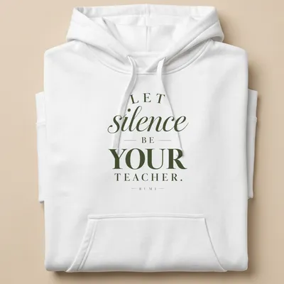 Elegant typography quote shirt featuring Rumi's wisdom about silence — printed on a unisex hoodie