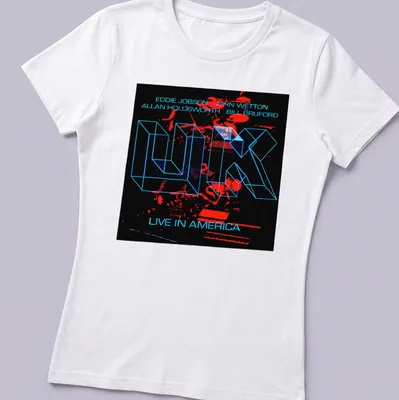 Neon geometric band names and live concert text in bright colors on black — printed on a women's shirt