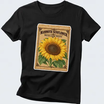 Vintage design featuring a sunflower and the text Mammoth Sunflower Heirloom Seeds in yellow and brown — printed on a women's shirt