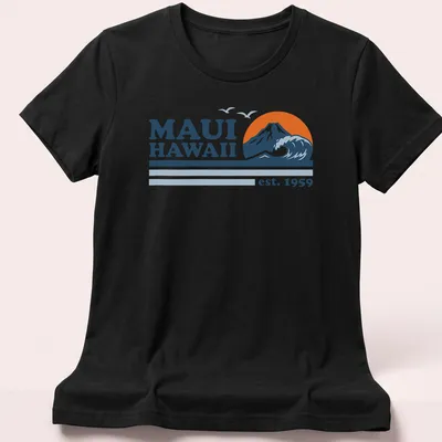 Vintage-style t-shirt featuring Maui Hawaii text with mountain and wave graphic — printed on a women's shirt
