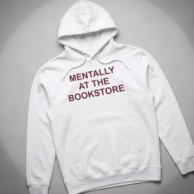 Bold typography t-shirt with the text 'Mentally At The Bookstore' in maroon and white — printed on a unisex hoodie