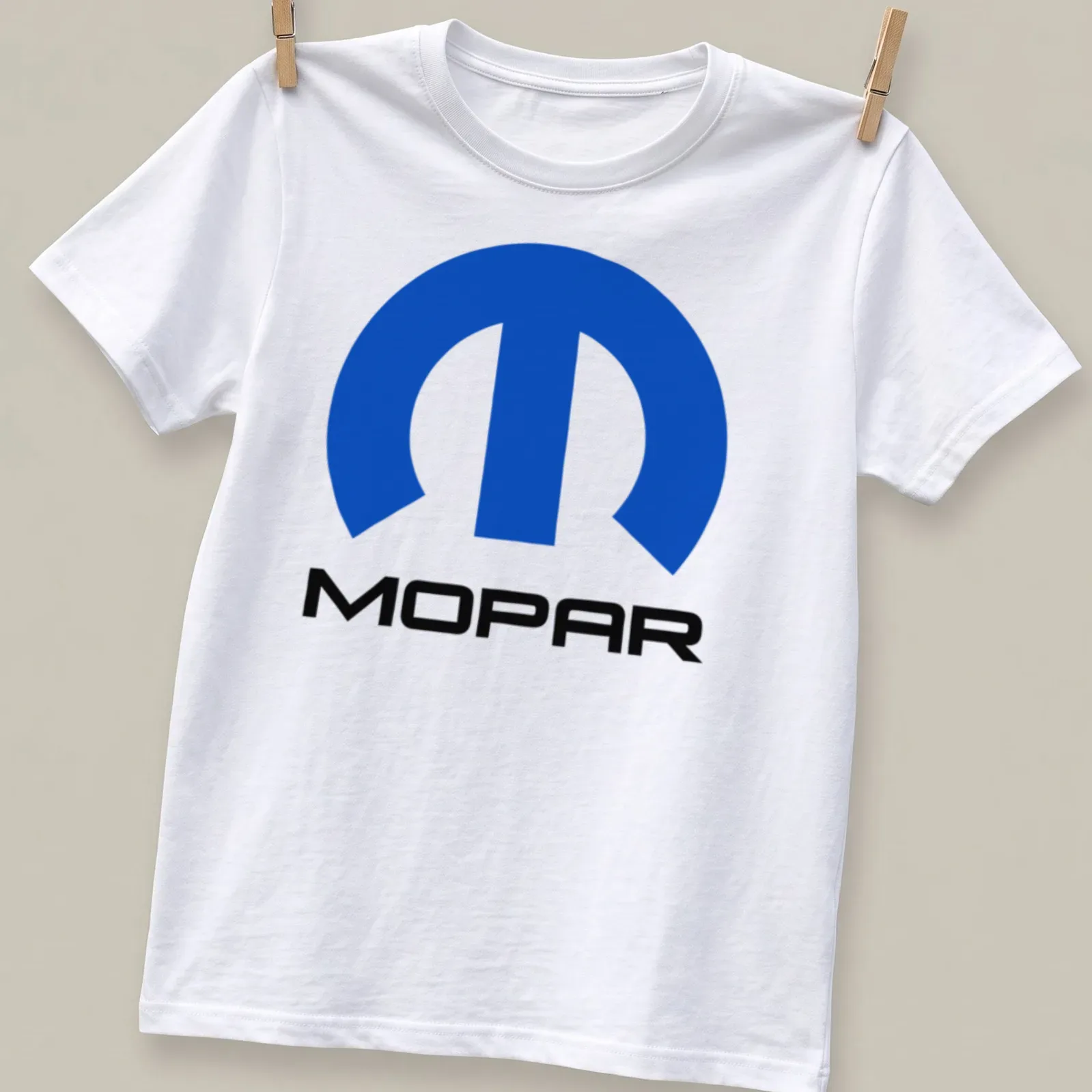 MOPAR logo in modern typography with blue, black, and white colors — printed on a unisex t-shirt