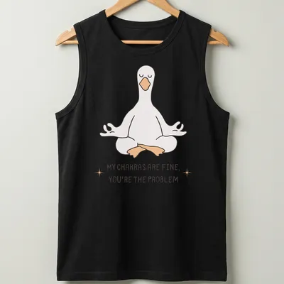 Kawaii line-art of a meditating goose with the phrase about chakras above it. — printed on a tank top