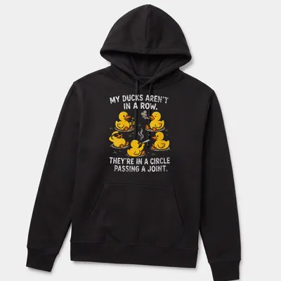 Funny cartoon shirt with yellow ducks and humorous text about ducks passing a joint — printed on a unisex hoodie