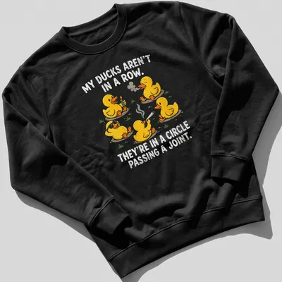 Funny cartoon shirt with yellow ducks and humorous text about ducks passing a joint — printed on a unisex sweatshirt