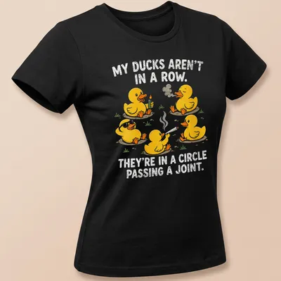 Funny cartoon shirt with yellow ducks and humorous text about ducks passing a joint — printed on a women's shirt