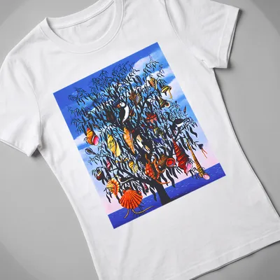 Illustrative shirt featuring a tree decorated with colorful seashells — printed on a women's shirt