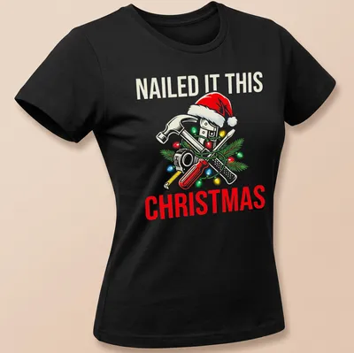 Cartoonish design featuring tools and text for Christmas in festive colors — printed on a women's shirt