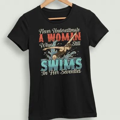 Vintage illustration of a swimmer with empowering text in blue, red, cream, and black — printed on a women's shirt