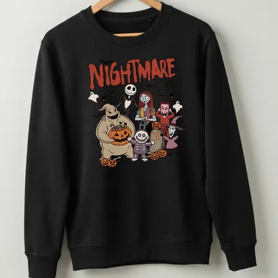 Cartoon Halloween characters with text 'NIGHTMARE ON MAIN STREET WISH YOU WERE HERE' in vibrant colors — printed on a unisex sweatshirt