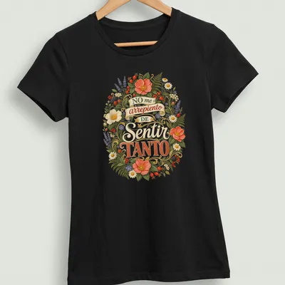 Expressive floral design with the phrase 'NO me arrepiento DE Sentir TANTO' in vibrant colors — printed on a women's shirt