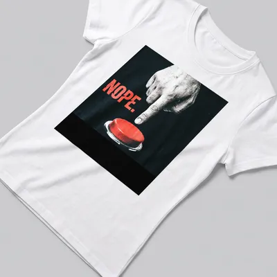 Minimalist graphic of a hand pressing a red button with the word 'NOPE.' — printed on a women's shirt